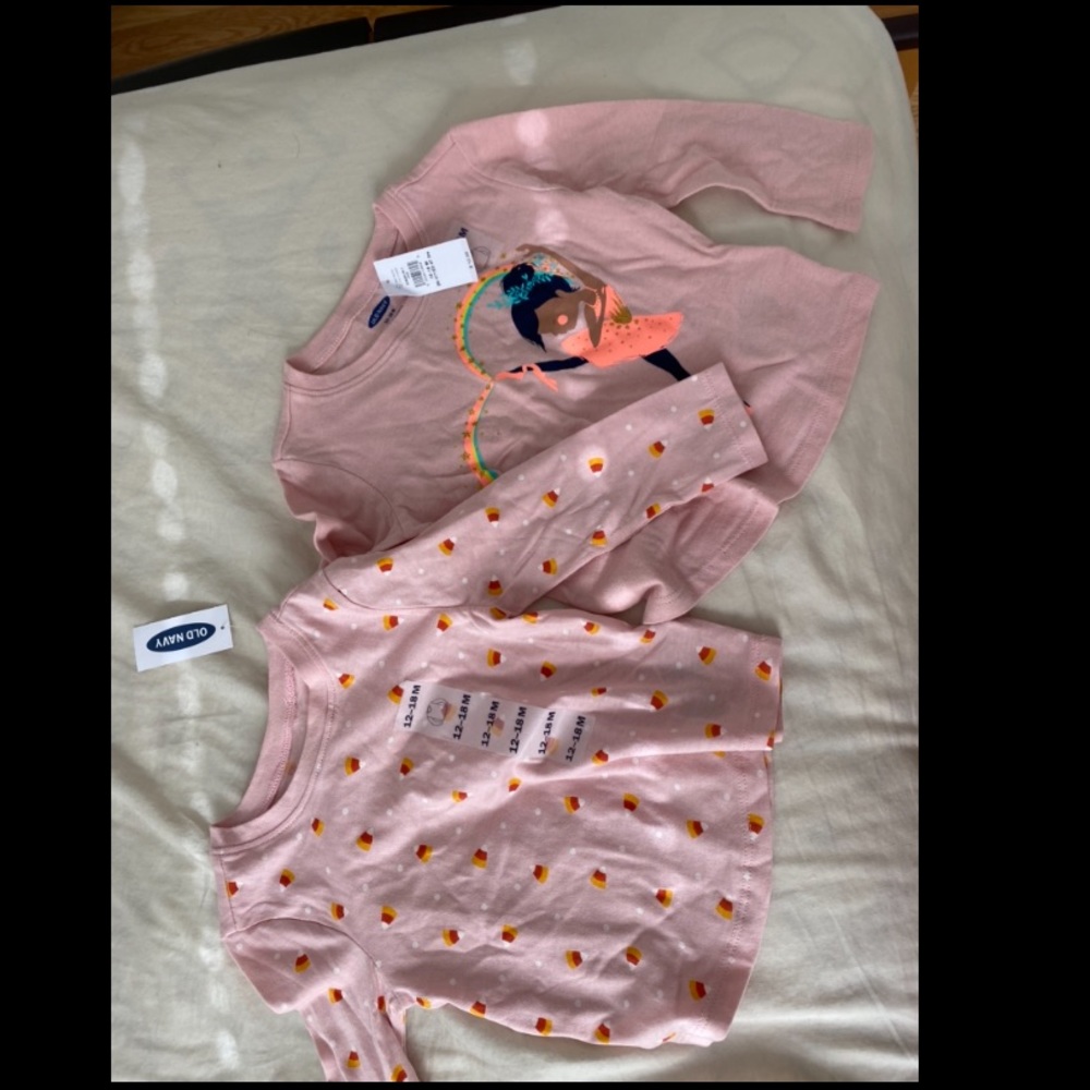 Brand new 2 old navy baby girl shirts.